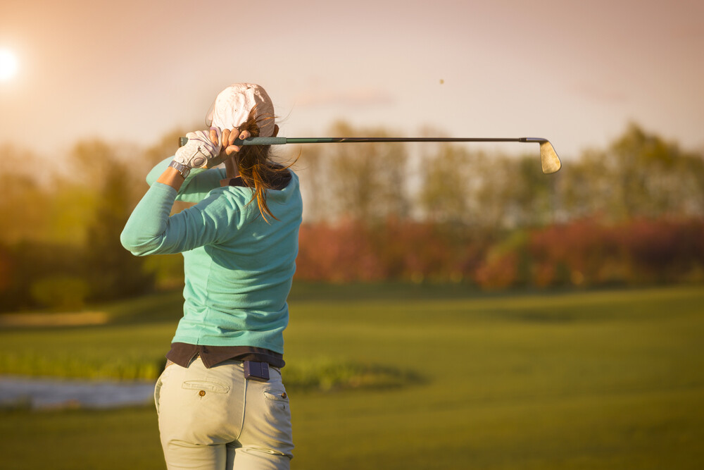 woman playing golf services