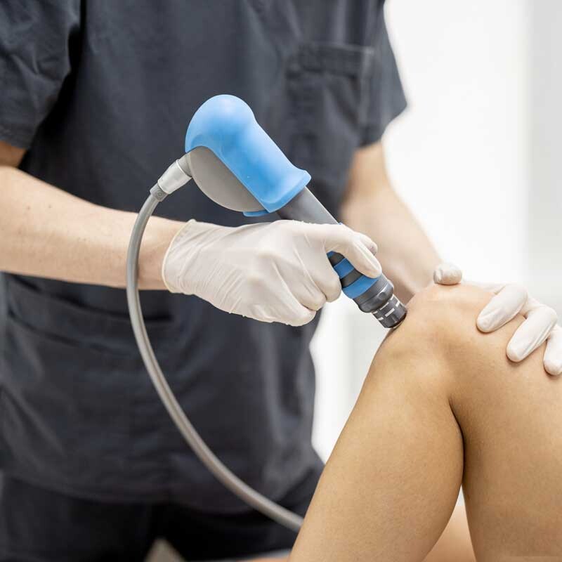 Overworked tired old lady holding glasses feeling headache after computer work.